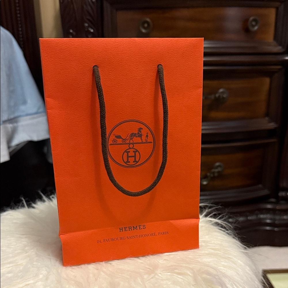 Hermès Orange Shopping Bag with Dark Brown Handles. 22cm Tall